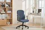 Blue office chair with wheels and armrests in home workspace beside white desk and bookshelf