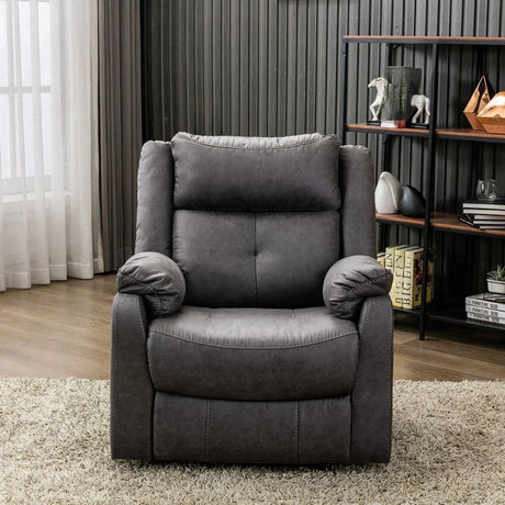 Grey recliner armchair with plush cushions and padded arms on beige rug in modern living room