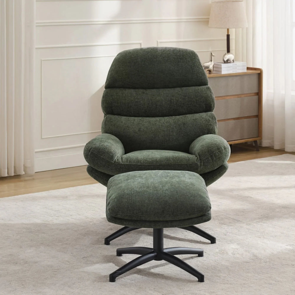 Green leisure chair with matching footstool on black metal base in modern living room