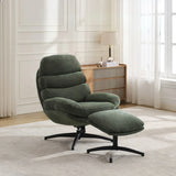 Green leisure chair with footstool set on black metal base in modern living room