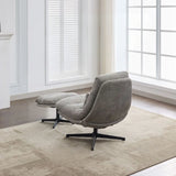 Grey leisure chair with footstool on beige rug in bright living room