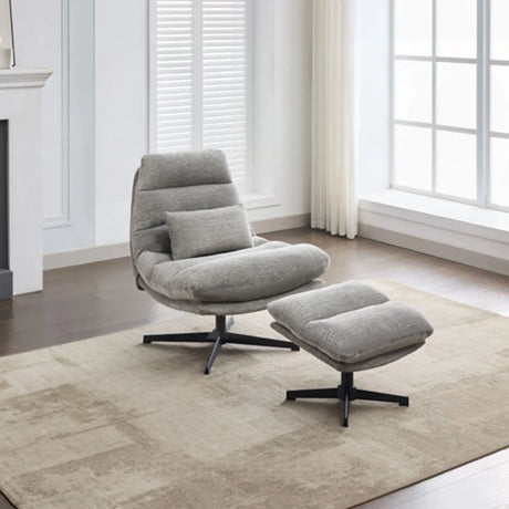 Grey swivel leisure chair with matching footstool and cushion in modern living room