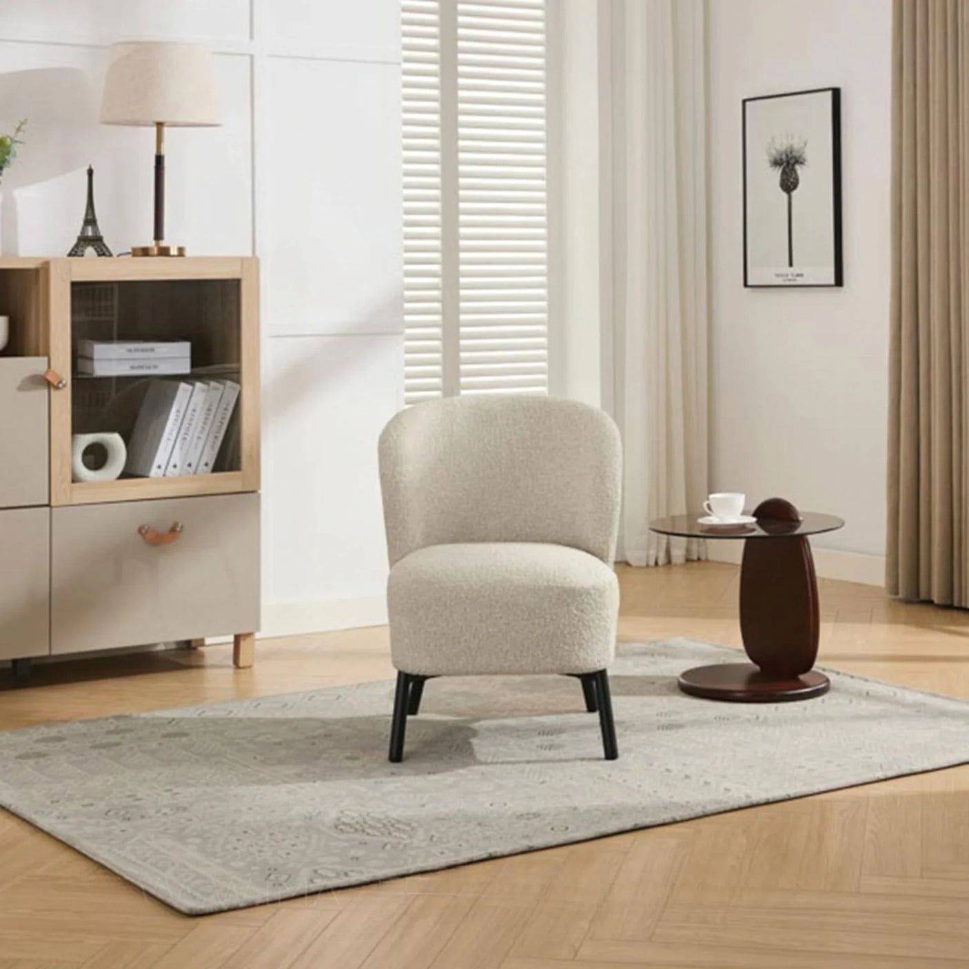 Natural beige accent chair with curved backrest on grey rug in modern living room