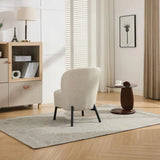 Natural beige accent chair with black legs on rug in modern living room
