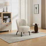Natural beige accent chair with black legs on patterned rug in modern living room