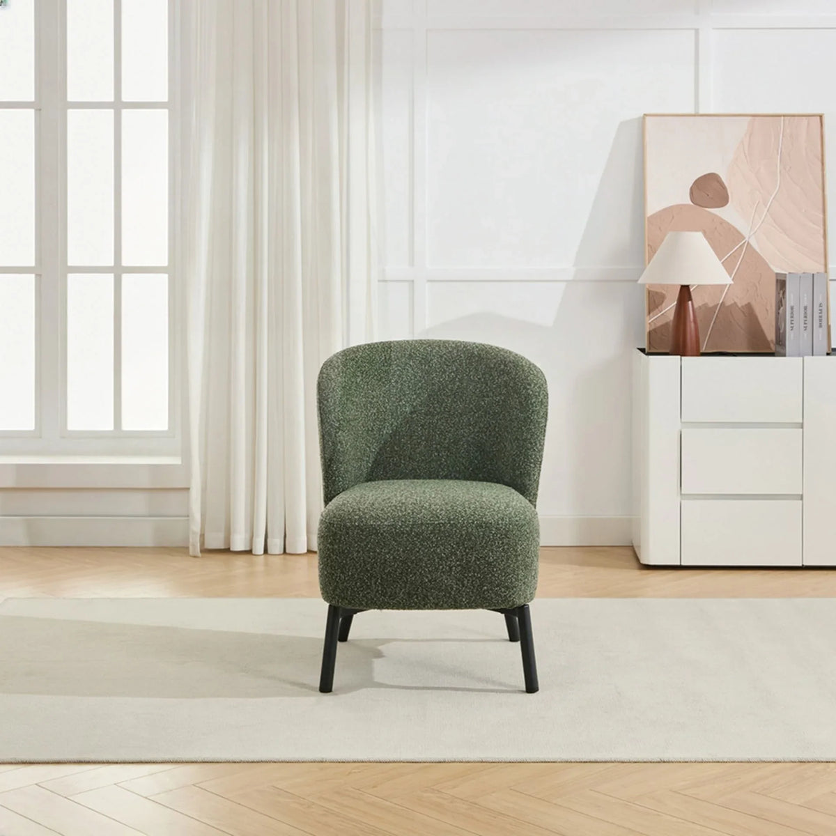 Forest green accent chair with fabric upholstery and black legs in modern living room