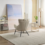 Beige accent chair with metal legs on light rug in modern living room