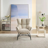 Beige accent chair with padded backrest and black legs in modern living room setting