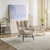 Beige accent chair with plush upholstery and black legs in a modern living room setting