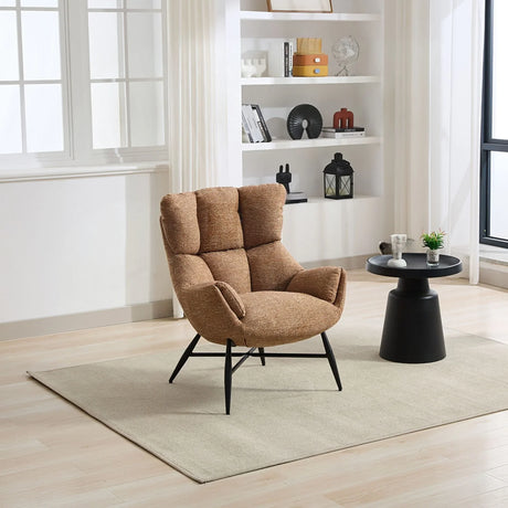 Rust accent chair with cushioned seat and black legs in a modern living room beside round table