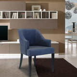 Grey fabric accent chair with curved arms on rug in modern living room setting