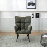 Green accent chair with tufted upholstery and black legs in modern living room setting