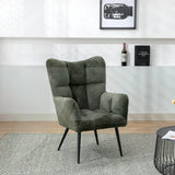 Green accent chair with black metal legs, textured upholstery, set on patterned rug in lounge
