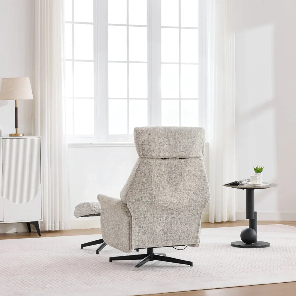 Beige swivel chair with footstool in modern living room, shown from rear angle