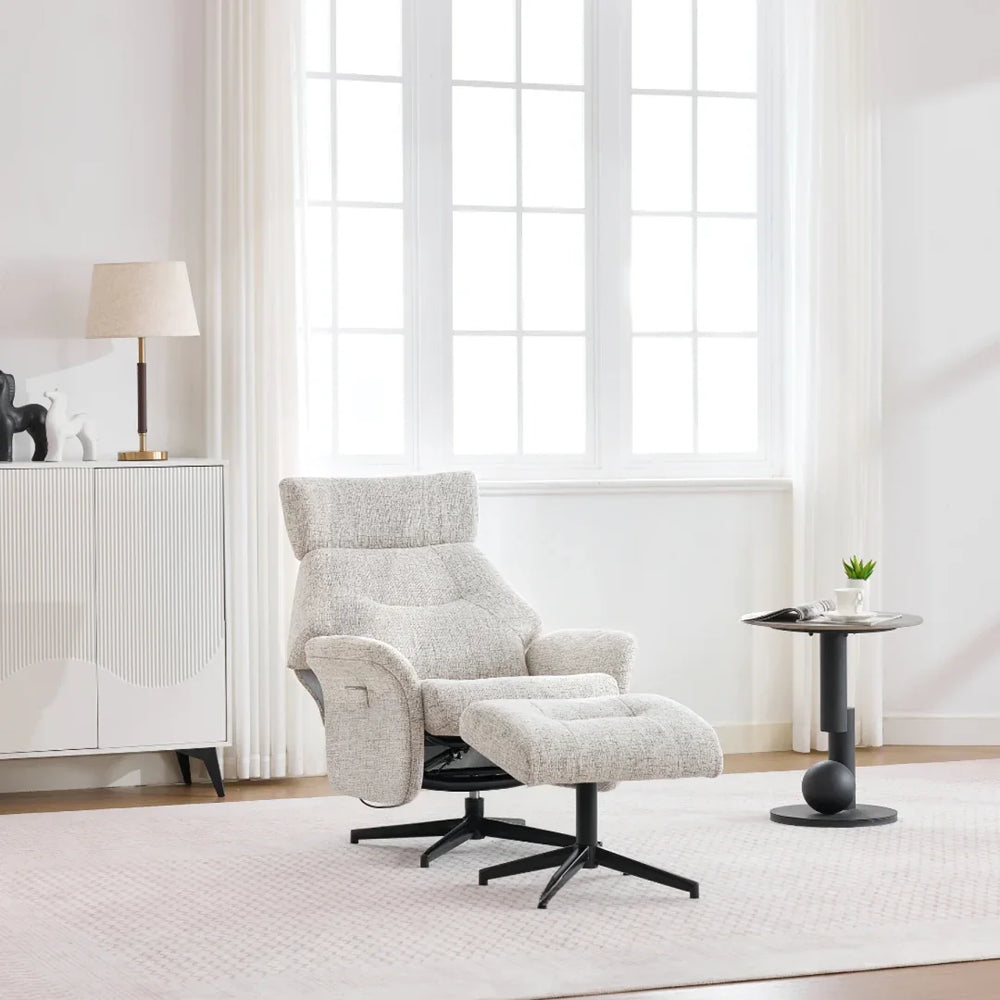Beige swivel chair with footstool on black base in bright modern living room