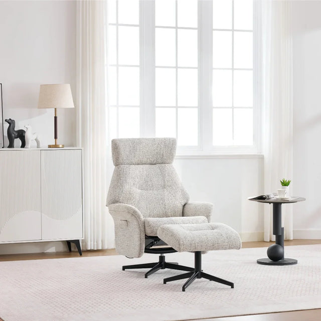Beige swivel chair and matching footstool with metal base in bright living room setting