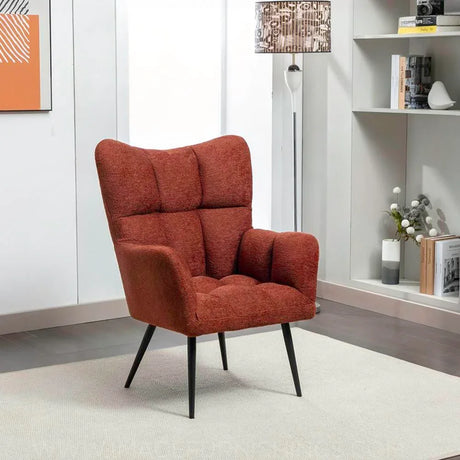 Rust accent chair with textured upholstery and black legs in modern living room setting