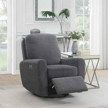 Dark grey swivel chair with footrest extended in modern living room setting