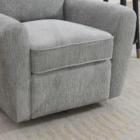 Grey swivel chair with soft textured fabric and padded seat on light patterned rug