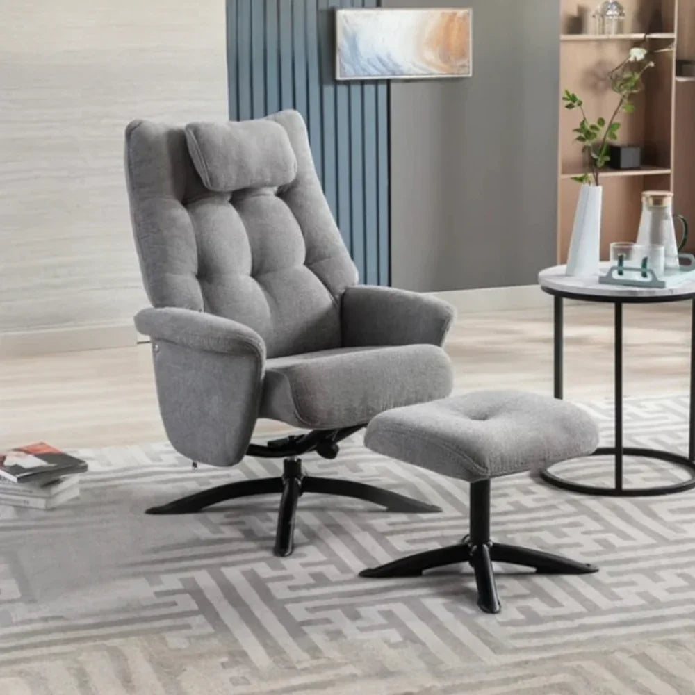 Dark grey recliner chair with matching ottoman on geometric rug in modern living room