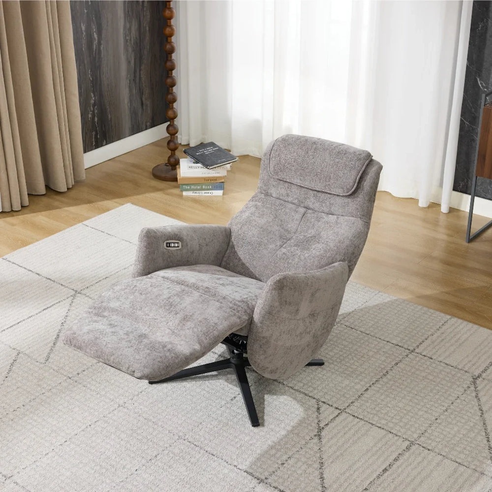 Stone fabric swivel chair with recliner and footrest on patterned rug in living room
