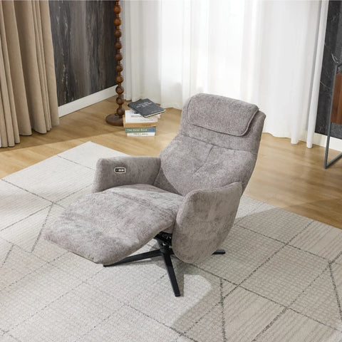 Stone fabric swivel chair with recliner and footrest on patterned rug in living room
