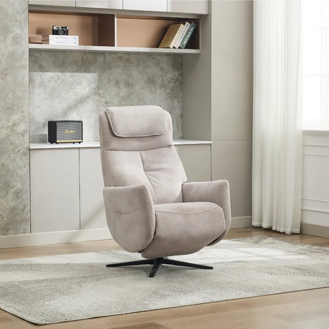 Oyster swivel chair with padded seat and headrest on a patterned rug in modern living room