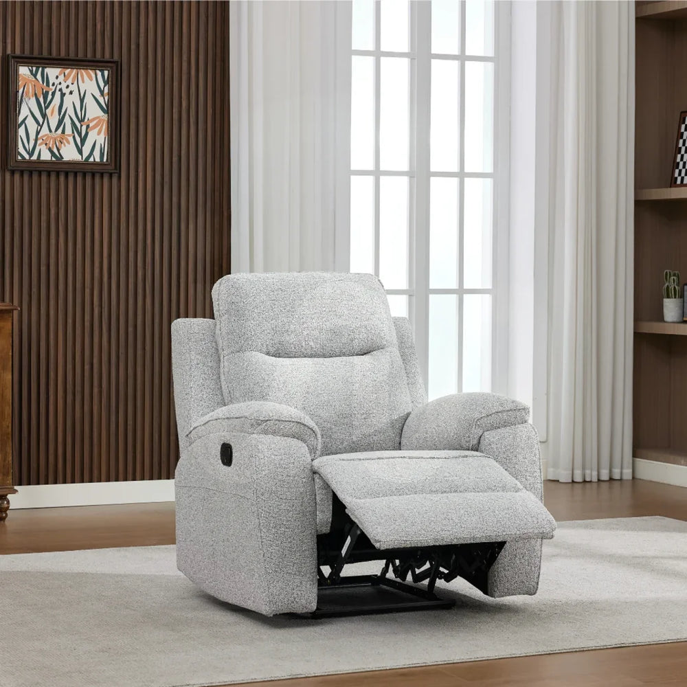 Light grey fabric armchair recliner with footrest in modern living room setting