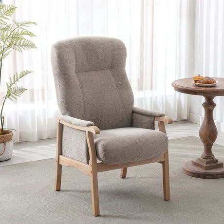 Oatmeal upholstered armchair with wooden frame in bright living room setting
