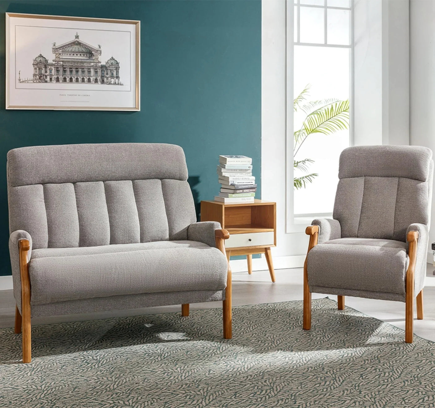 Blaze fireside chair in silver fabric with wooden legs beside matching sofa in modern living room