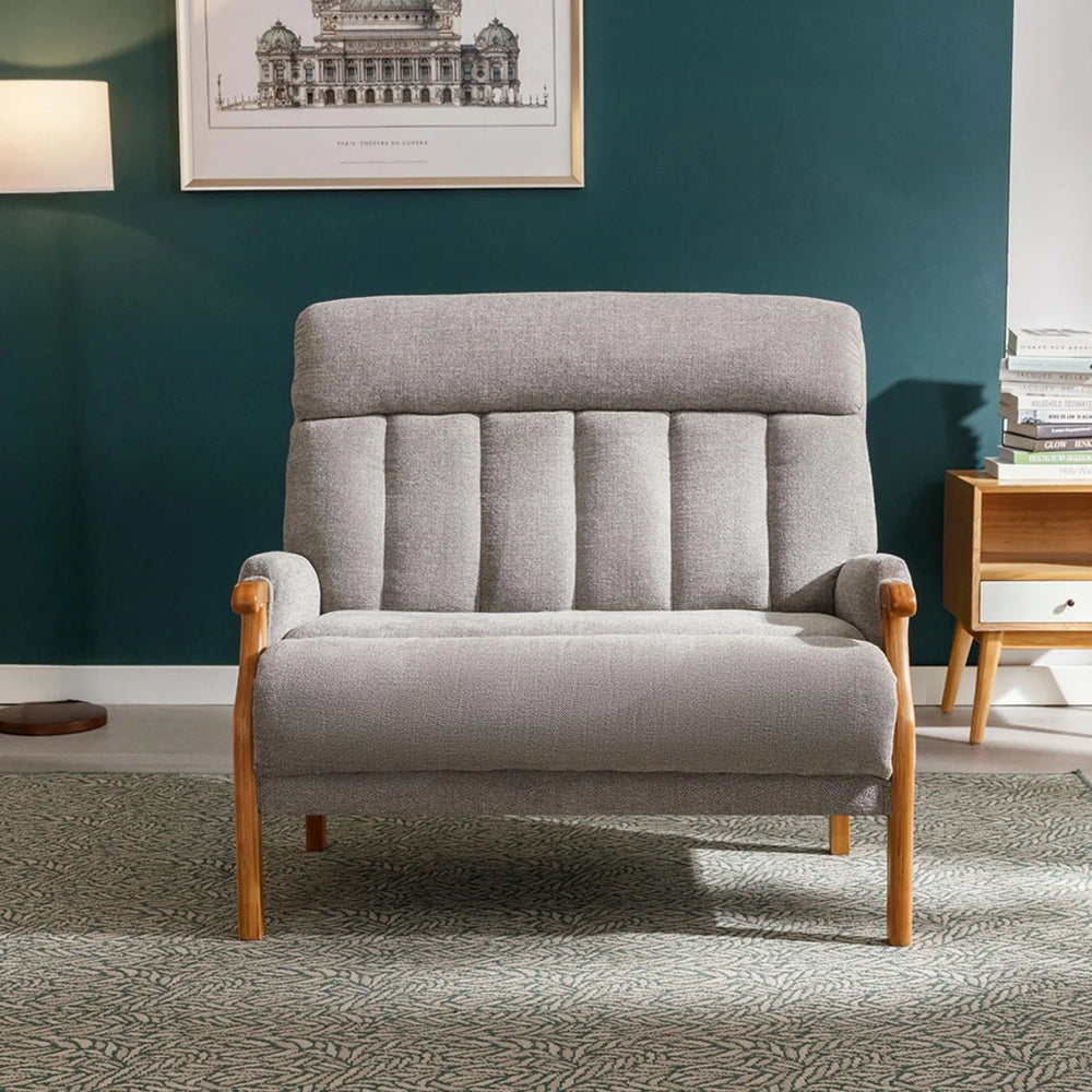 Blaze Fireside loveseat in silver fabric with wooden arms on patterned rug in living room