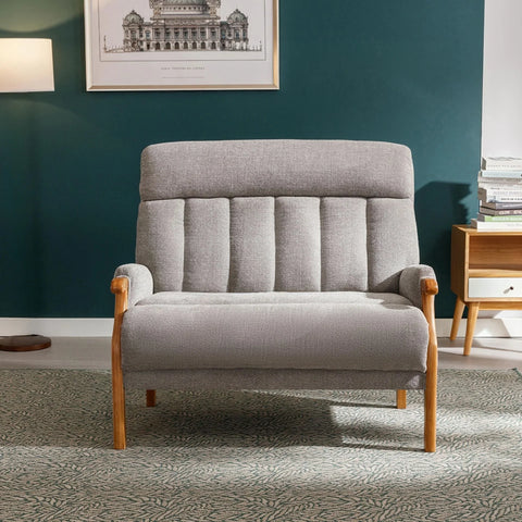 Blaze Fireside loveseat in silver fabric with wooden arms on patterned rug in living room