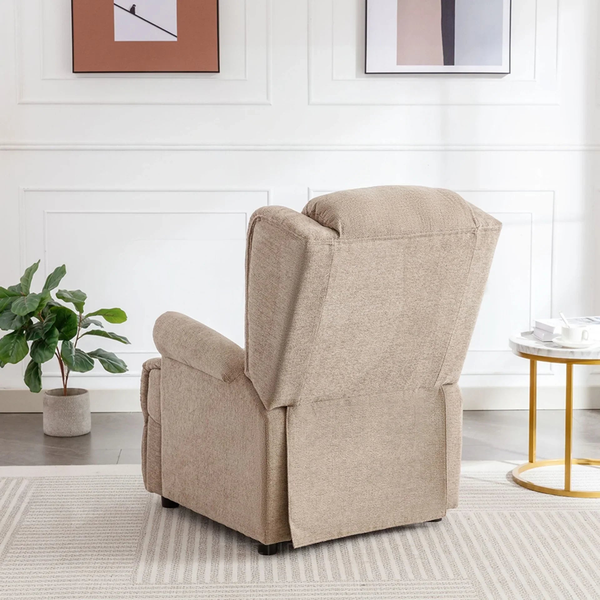 Oatmeal fireside chair with fabric upholstery shown from the back in a modern living room