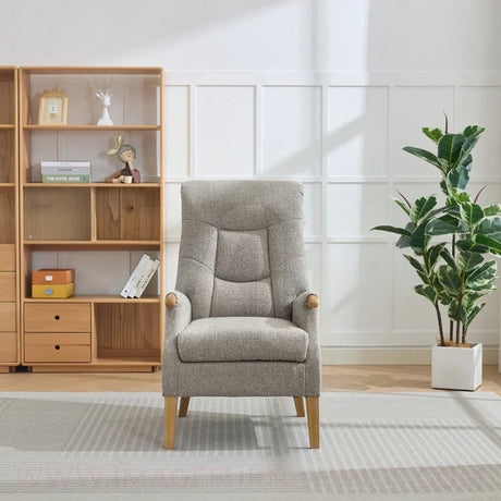 Beige thistle chair with wooden legs in modern living room setting on patterned rug