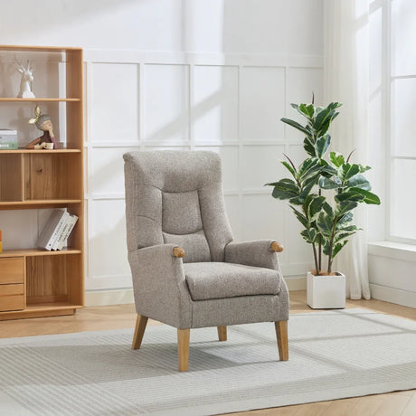 Beige upholstered accent chair with wooden legs in modern living room setting