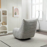 Ryder reclining chair in ash grey fabric on modern rug in bright living room
