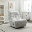 Light grey reclining chair with tufted fabric in a modern living room setting
