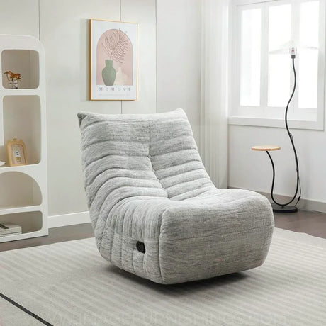 Light grey reclining chair with tufted fabric in a modern living room setting