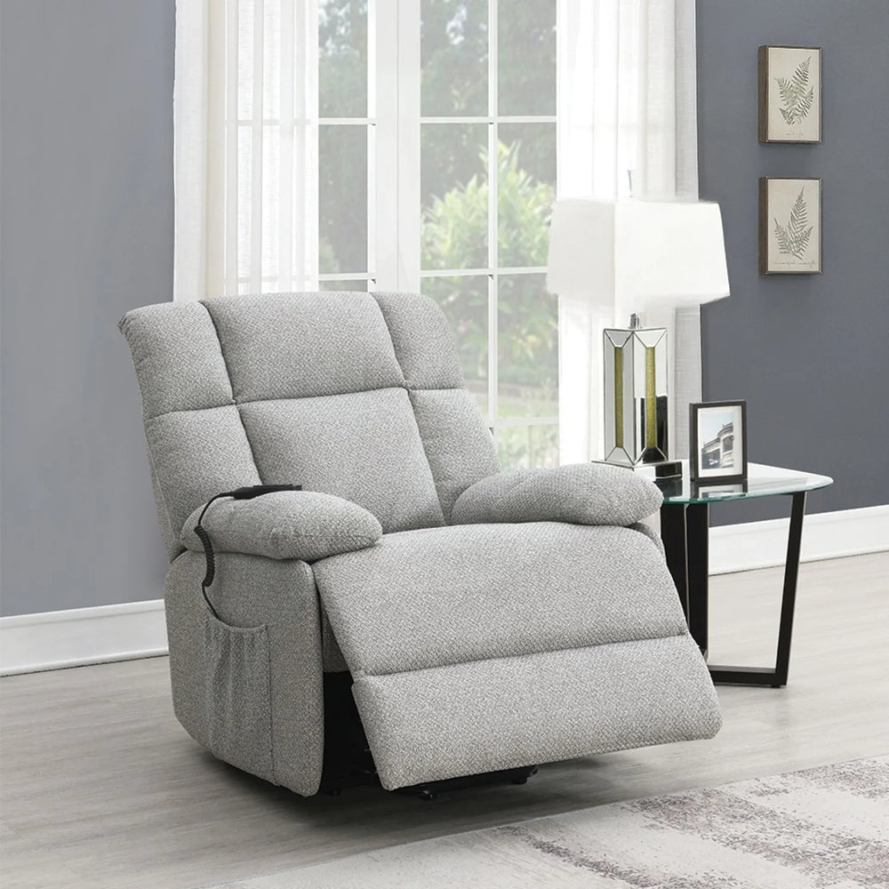 Light grey lift and rise massage chair reclined in modern living room setting