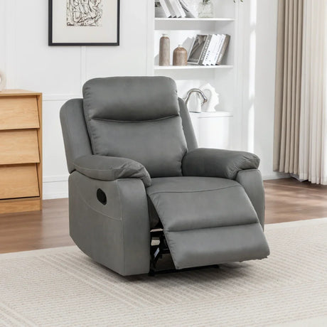 Charcoal recliner chair with padded arms and footrest in living room setting