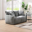 Light grey fabric 2 seater loveseat with cushions in a modern living room setting