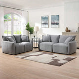 Light grey 2-seater loveseat sofa with cushions in modern living room setting