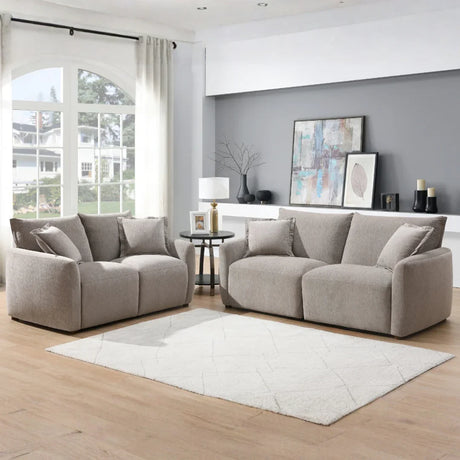 Stone fabric 2 seater loveseat and sofa set in modern living room with large window