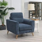 Blue fabric armchair with wooden legs in modern living room setting
