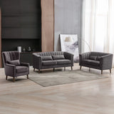 Graphite fabric sofa set with armchair and two-seater sofas on light wood floor in modern lounge