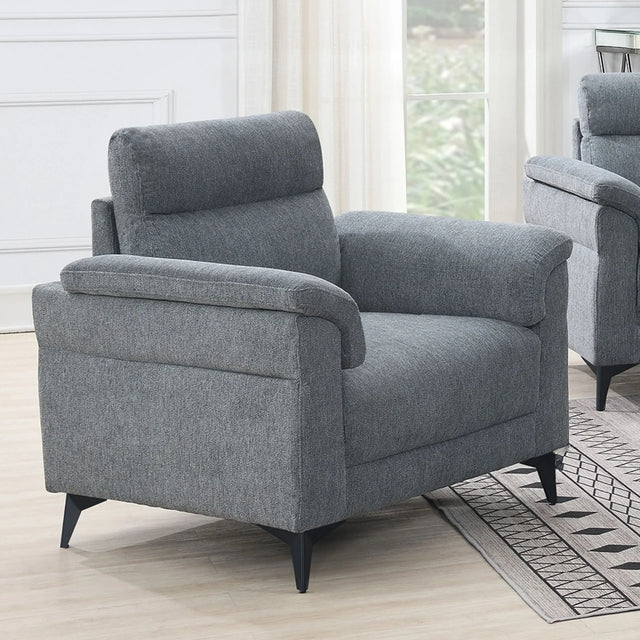 Grey fabric armchair with cushioned backrest and angled black legs in modern living room