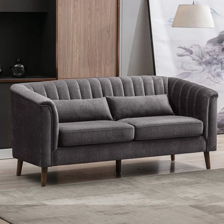 Graphite fabric sofa with channel tufted back and wooden legs in modern living room