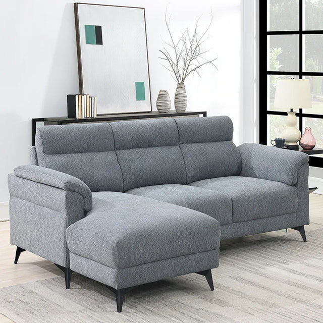 Grey fabric corner sectional sofa with chaise and black legs in modern living room