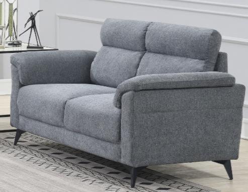 Grey fabric two seater sofa with cushioned backrest and slim black legs in living room setting