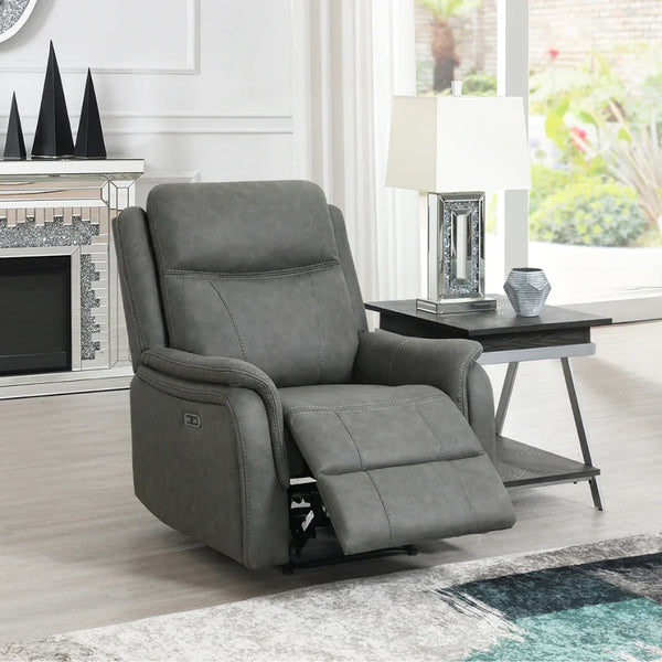 Stone grey armchair recliner with padded arms in modern living room beside side table